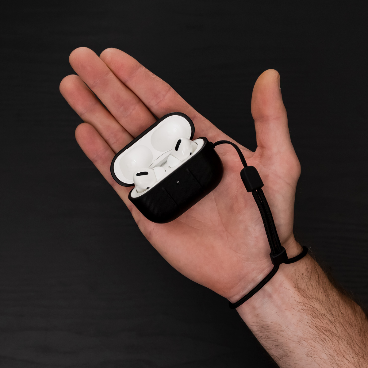 AirPodsProCase_WristLanyard_OpenCase1200x1200_02508b1f-b3f2-46c6-aebf-45d5e8e0b83e
