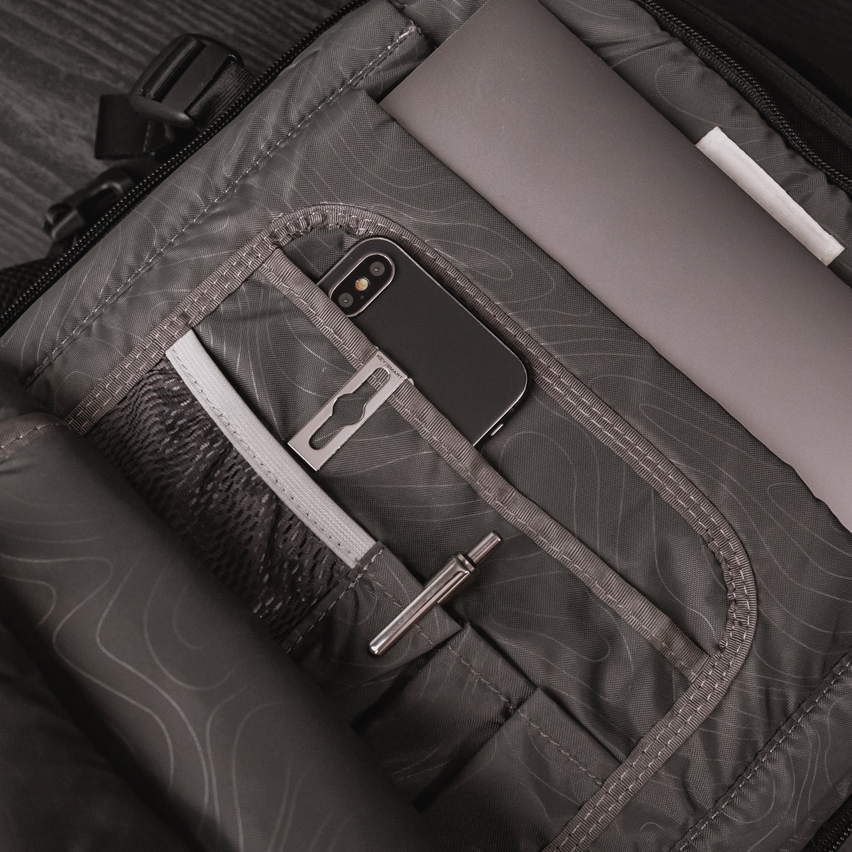PocketFuse_PhoneInBackpack_1200x1200_23ebeda1-c952-4c6b-aafc-2adf2bf6a5c0